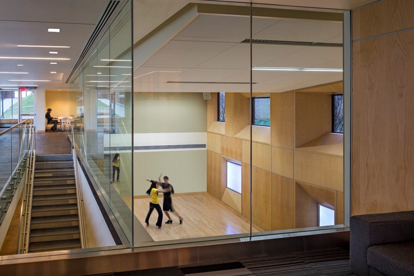 At the University of Michigan Alice Lloyd Hall, formerly unutilized basement spaces are transformed by natural light and visual connectivity.